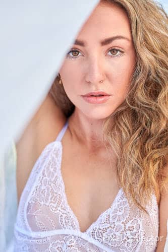 portrait of a young woman during a boudoir session