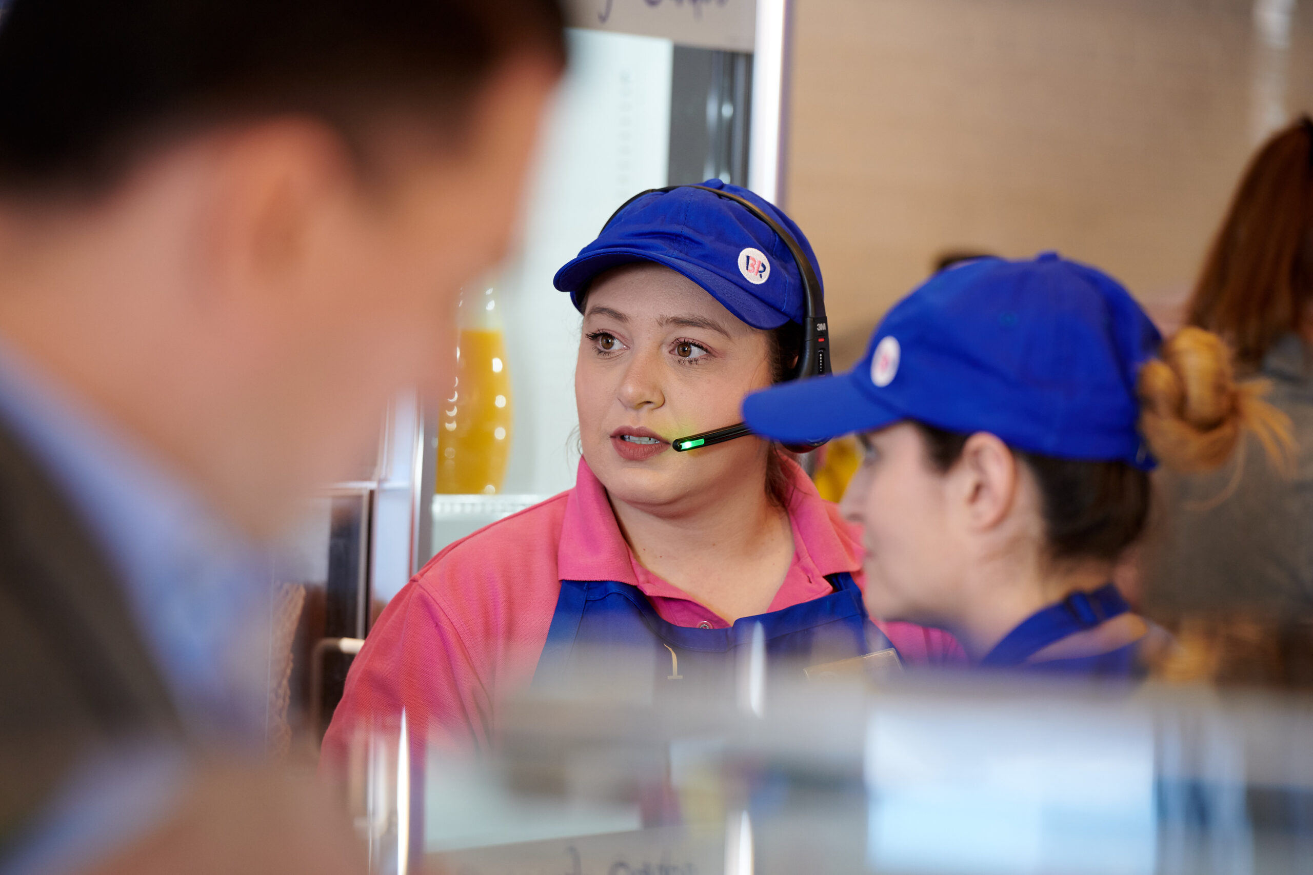 Staff interacting with the Baskin Robbins corporate employees.