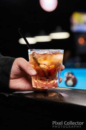 Commercial photo of a beverage at Clicks Billiards. Rum and Coke is always a great choice.