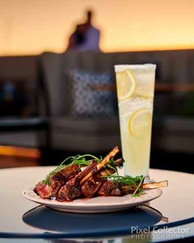 Photo of rooftop restaurant at sunset.