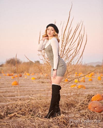 Standing in the pumpkin patch during her session.