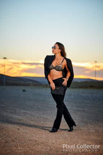 Model standing in front of the sunset.