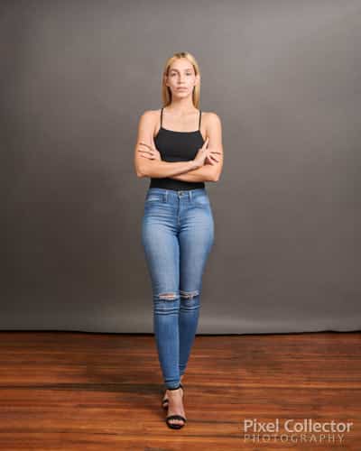 Woman standing facing the camera for an acting headshot.